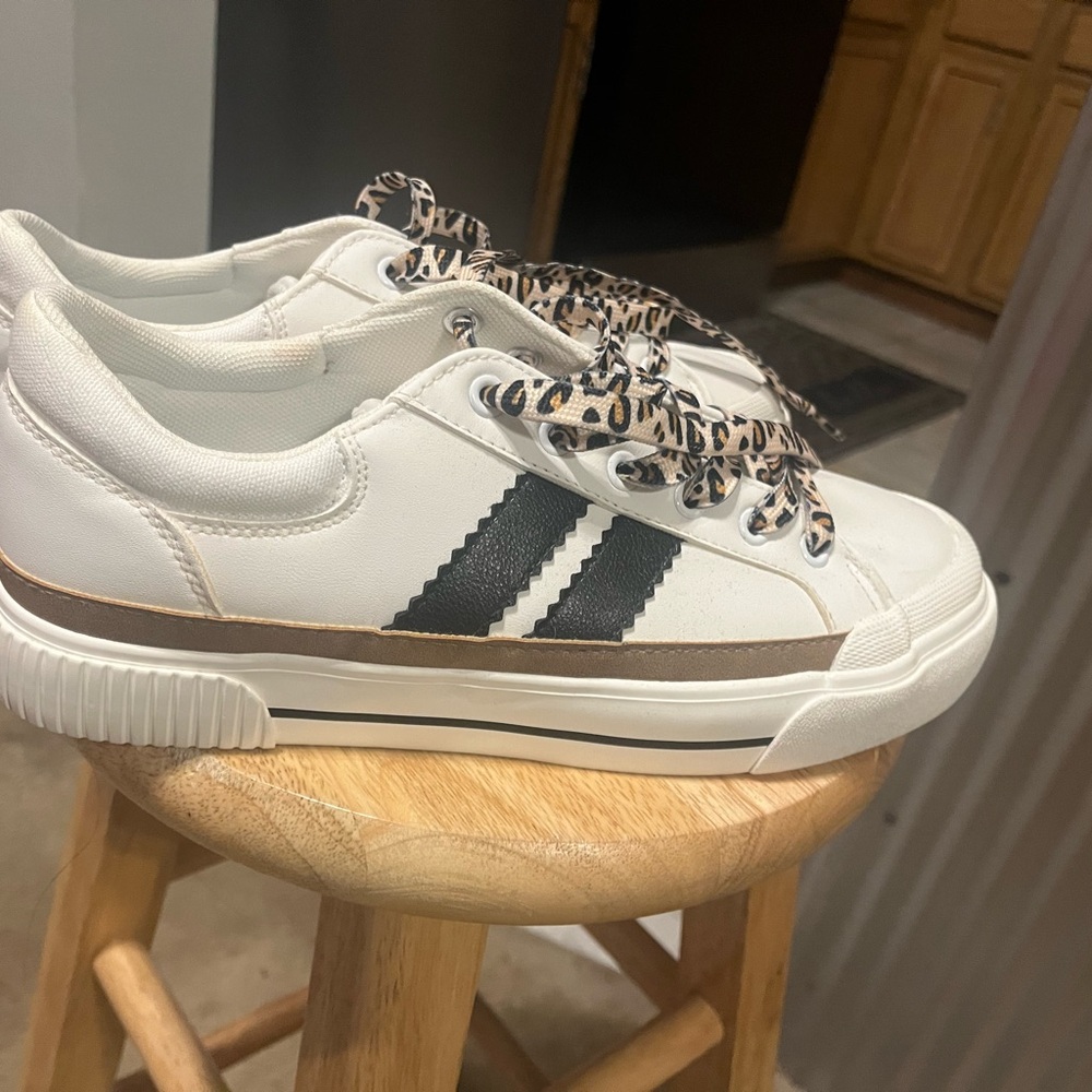Corkys White and Black Sneakers with Leopard Print Laces. They run narrow.